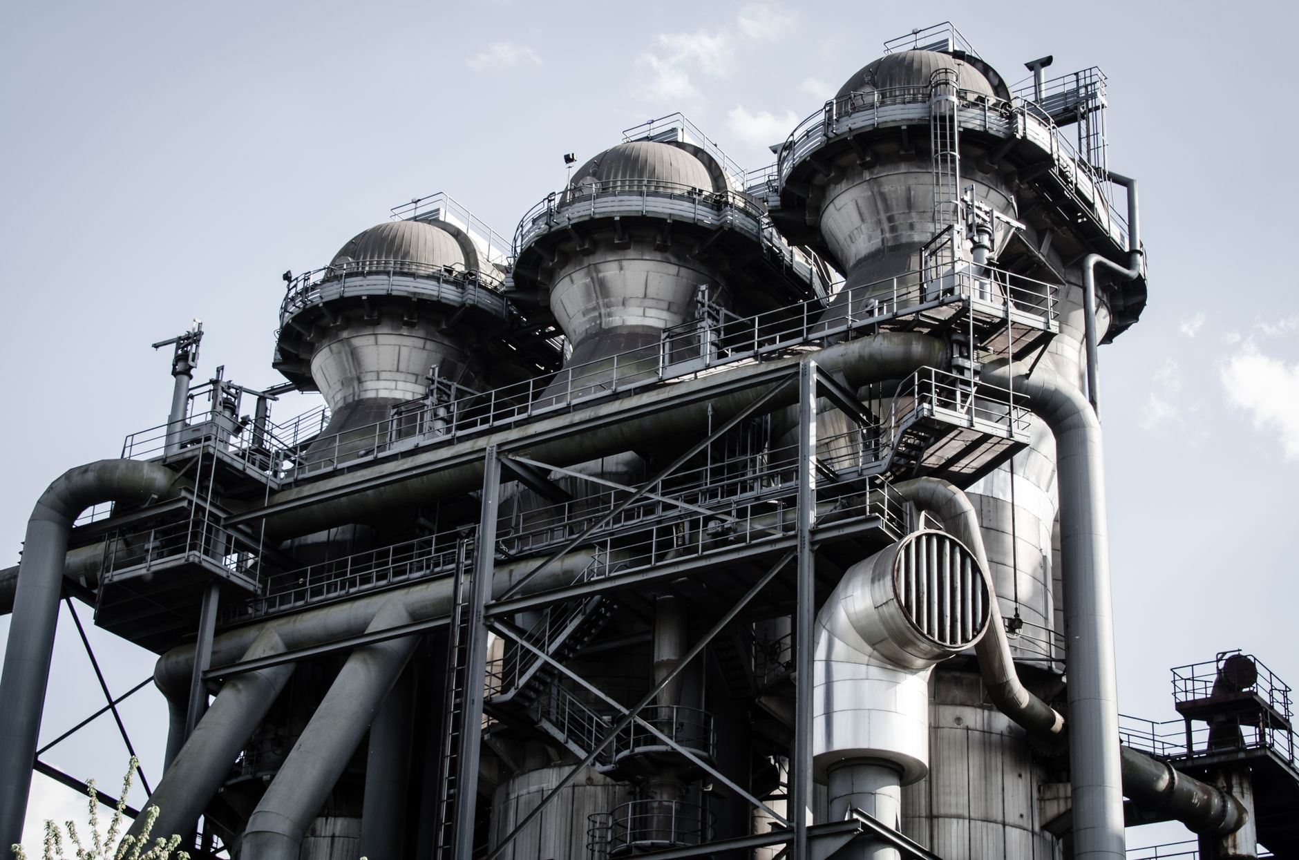 Industrial structure with pipes and machinery in Duisburg, Germany