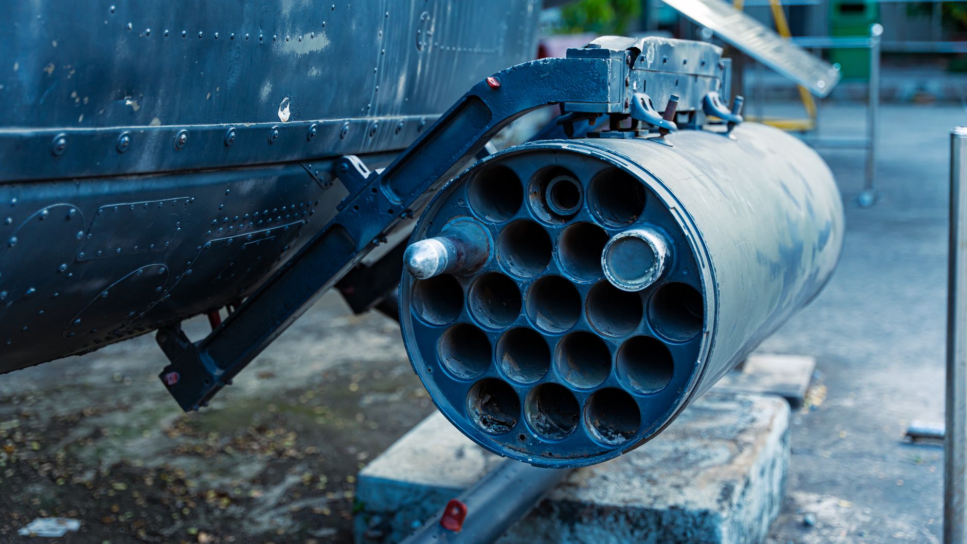 Military rocket launcher displayed outdoors