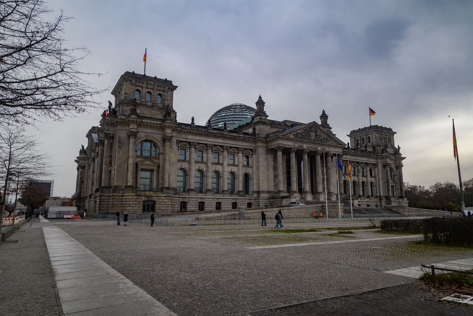 The Reichstag building in Berlin, seat of the German Bundestag, under a cloudy sky