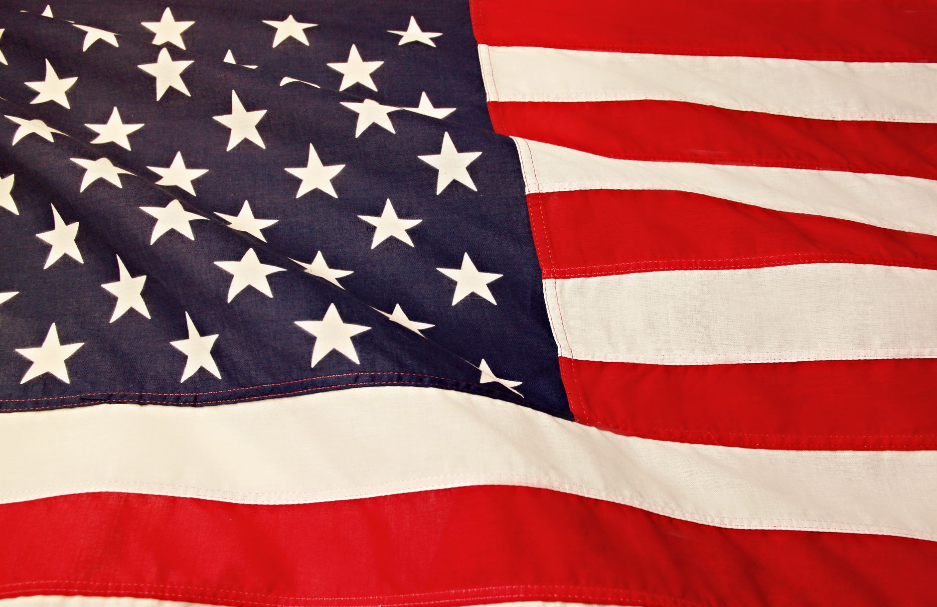 Close-up of the American flag showing the stars and stripes