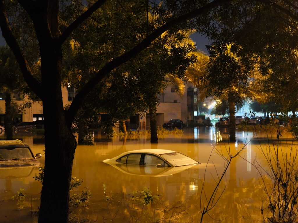 Cars submerged in a flooded street