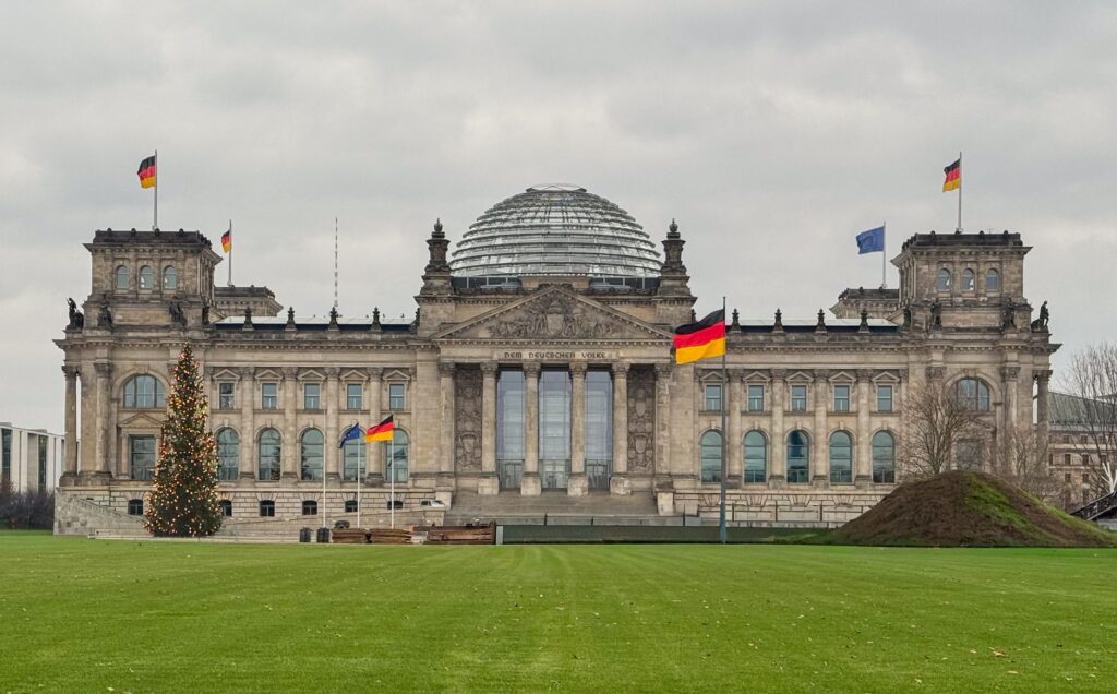 The Reichstag building in Berlin, Germany with flags