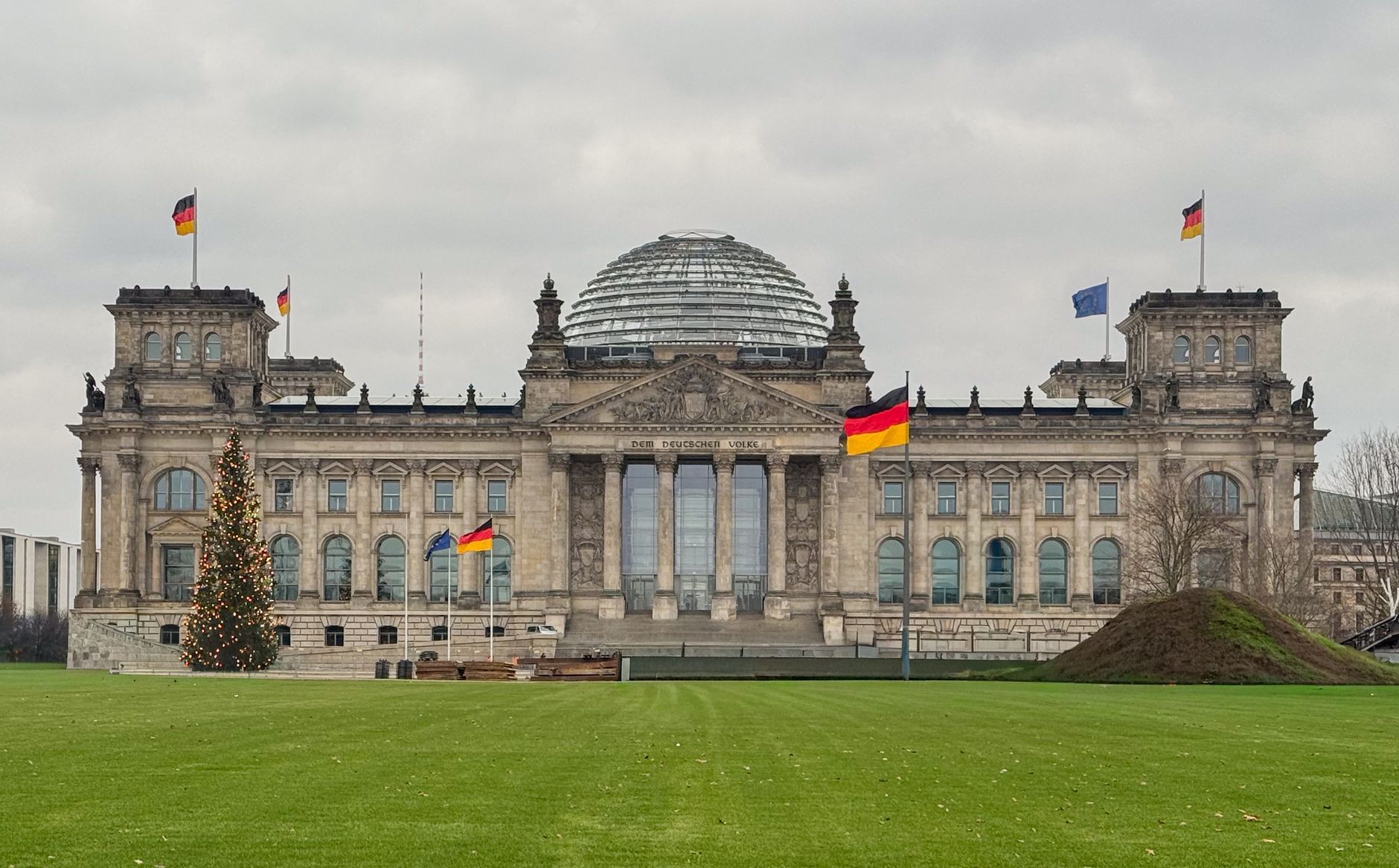 The Reichstag building in Berlin, Germany with flags