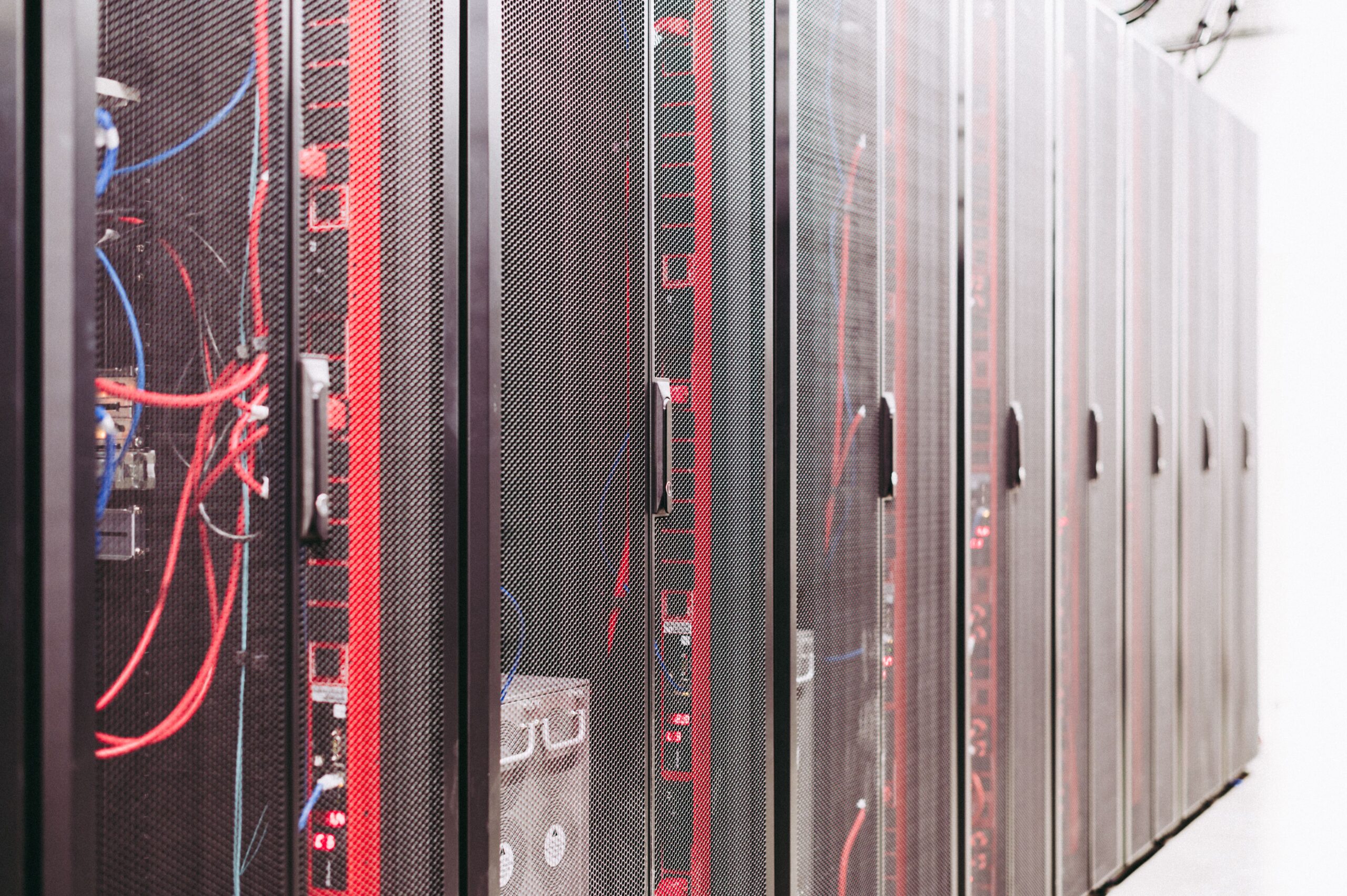 Rows of server racks in a data center